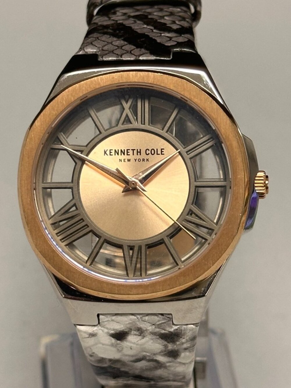 Kenneth Cole Womens Watch Gold Tone Transparent Dial Snake Print Leather Band